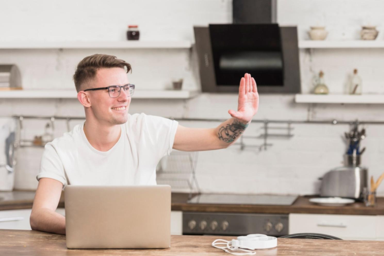 Person reviewing financial goals and celebrating milestone achievements